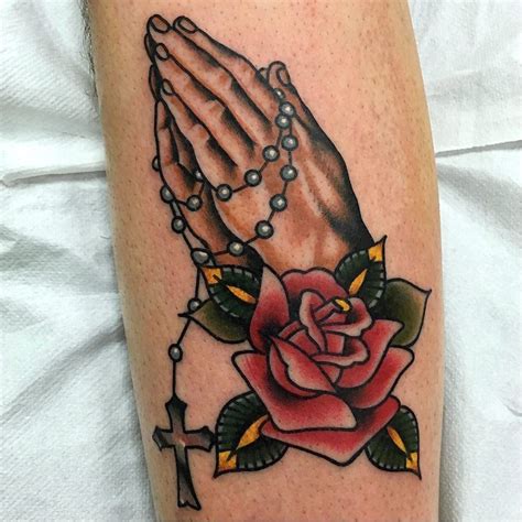 Gangster prayer hand with rosary tattoo